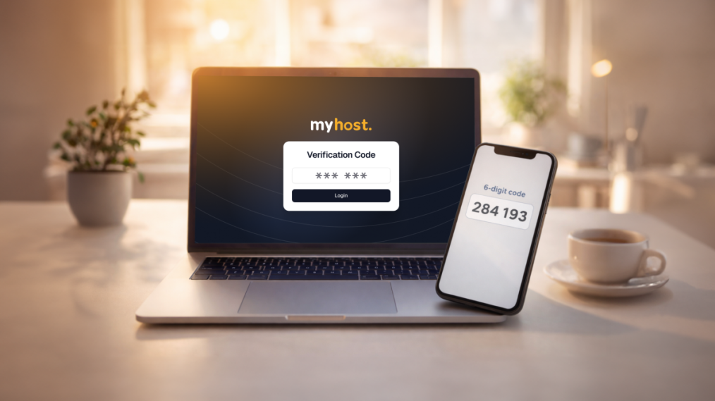 A laptop is on the dining table of a sunlit room. Its screen displays the MyHost logo with a verification code form underneath it. Beside the laptop is a phone with a 6 digit code (284193).